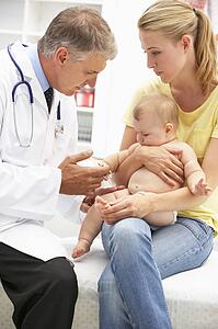 Pediatrician with baby