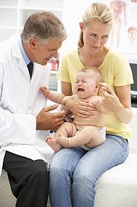 Pediatrician with baby