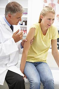 Doctor with female patient