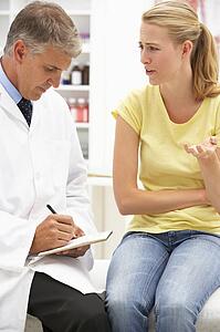 Doctor with female patient