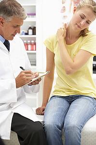 Doctor with female patient