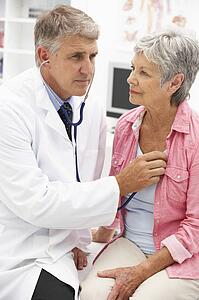 Doctor with female patient