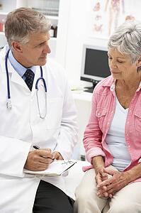 Doctor with female patient