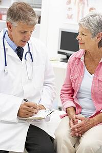 Doctor with female patient