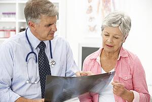 Doctor with female patient