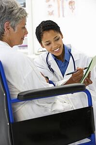 Doctor with female patient
