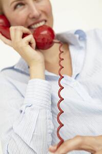 Woman talking on telephone