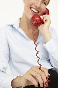 Woman talking on telephone