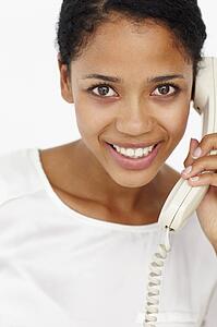 Woman talking on telephone