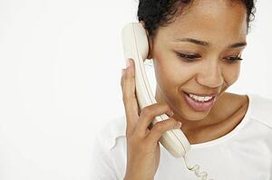 Woman talking on telephone