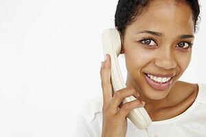 Woman talking on telephone