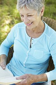 Senior woman reading a book
