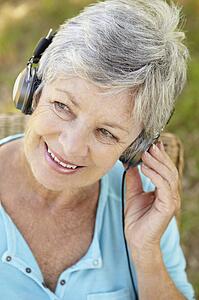 Senior woman with headphone