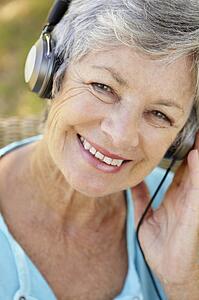 Senior woman with headphone