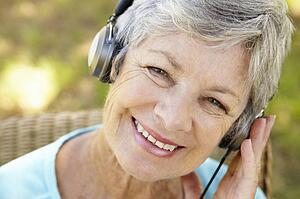 Senior woman with headphone