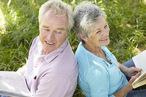 Portrait of senior couple reading