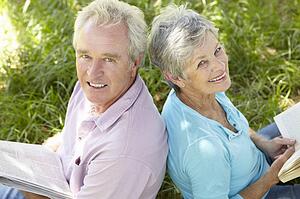 Portrait of senior couple reading