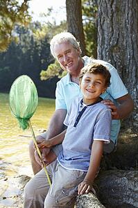 Man and boy fishing together
