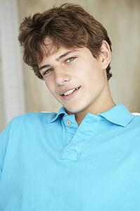 Portrait teenage boy at home