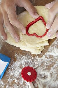 Detail close up young girl baking