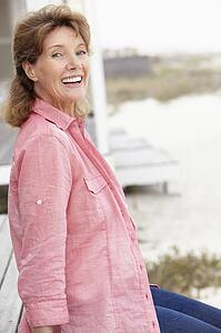 Senior woman sitting outdoors