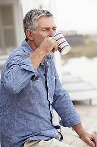 Senior man relaxing outdoors