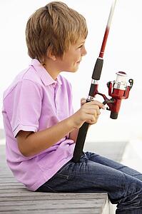 Young boy with fishing rod
