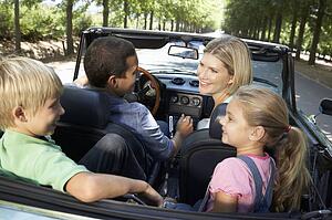 family in sports car