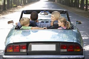 family in sports car