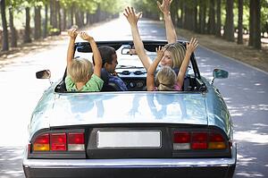 family in sports car