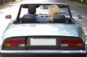 Couple in sports car