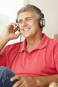 Mid age man wearing headphones