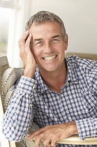 Mid age man at home