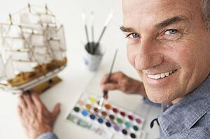 Mid age man model making