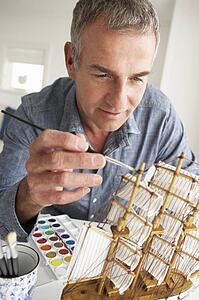 Mid age man model making
