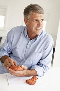 Mid age man clay modelling