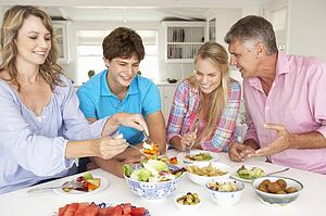 Family enjoying meal at home