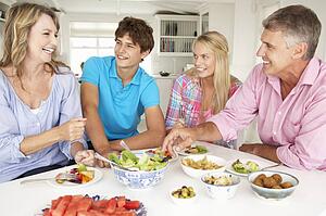 Family enjoying meal at home