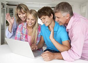 Family using laptop