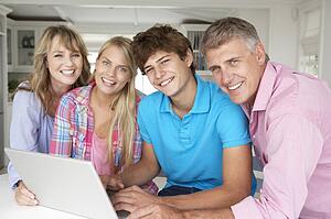 Family using laptop