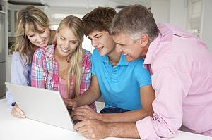 Family using laptop