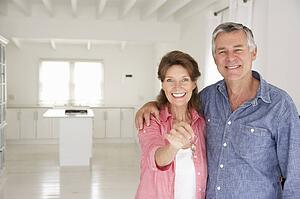 Senior couple in new home