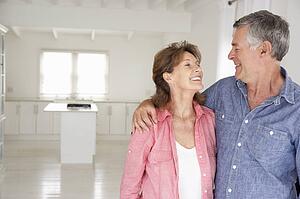 Senior couple in new home