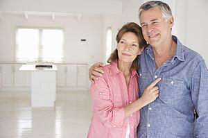 Senior couple in new home
