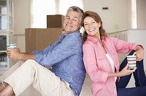 Senior couple in new home