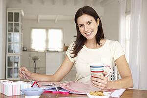 Woman scrapbooking