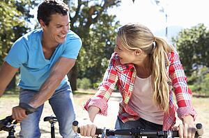 Young couple on country bike ride