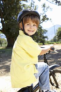 Little boy on country bike ride