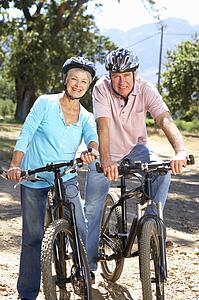 Senior couple on country bike ride