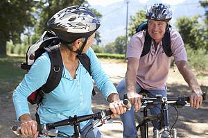 Senior couple on country bike ride